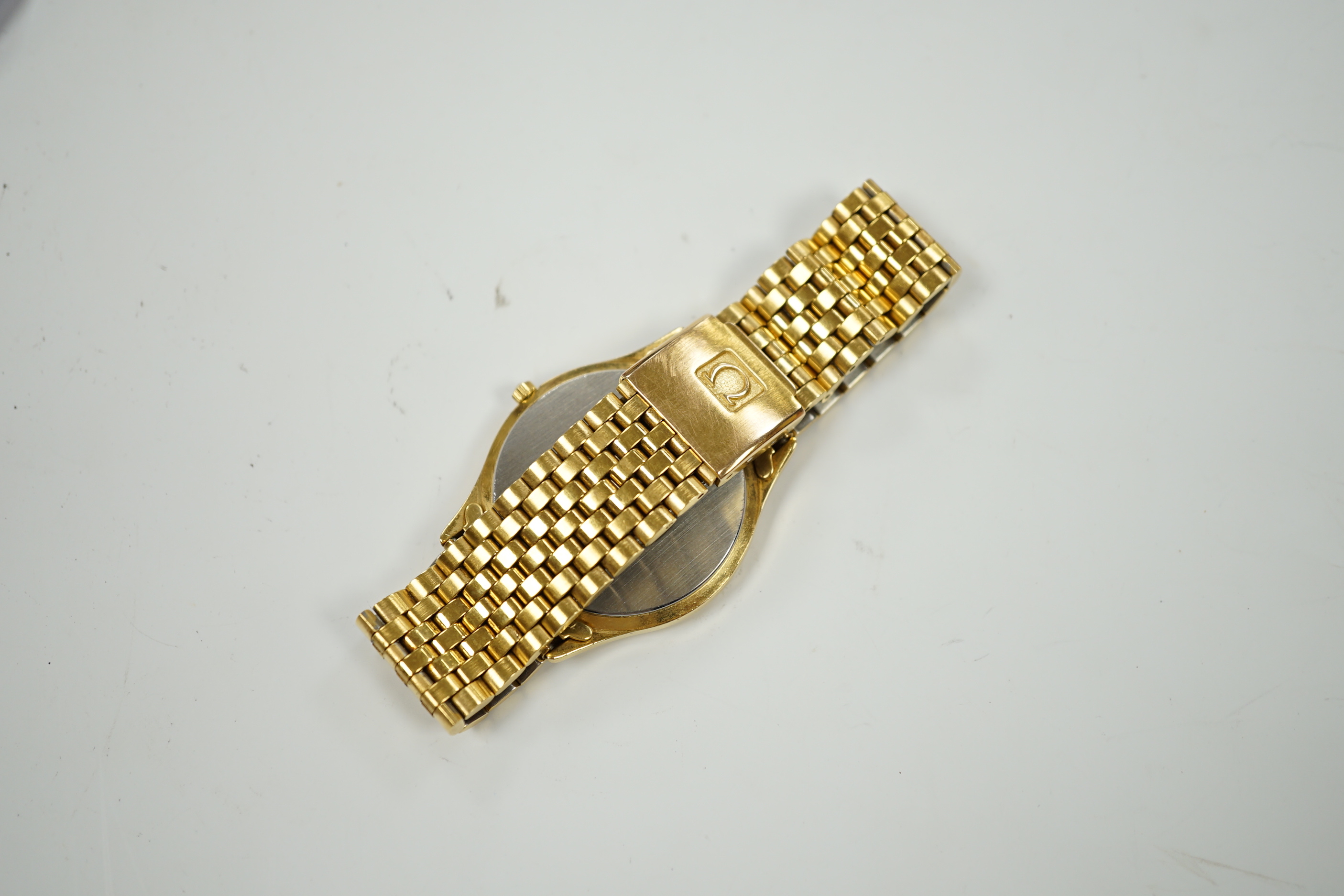 A gentleman’s steel and gold plated Omega Seamaster quartz wristwatch, with box or papers.